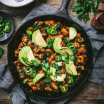 overhead view of vegan sweet potato breakfast hash in skillet