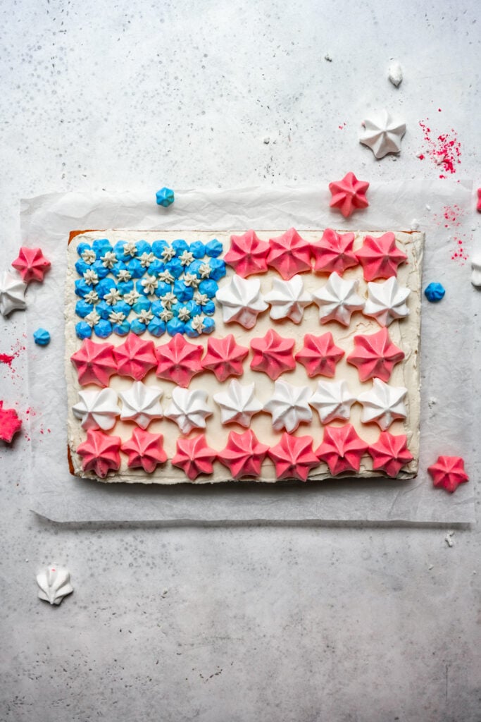 overhead view of vegan flag cake with meringues