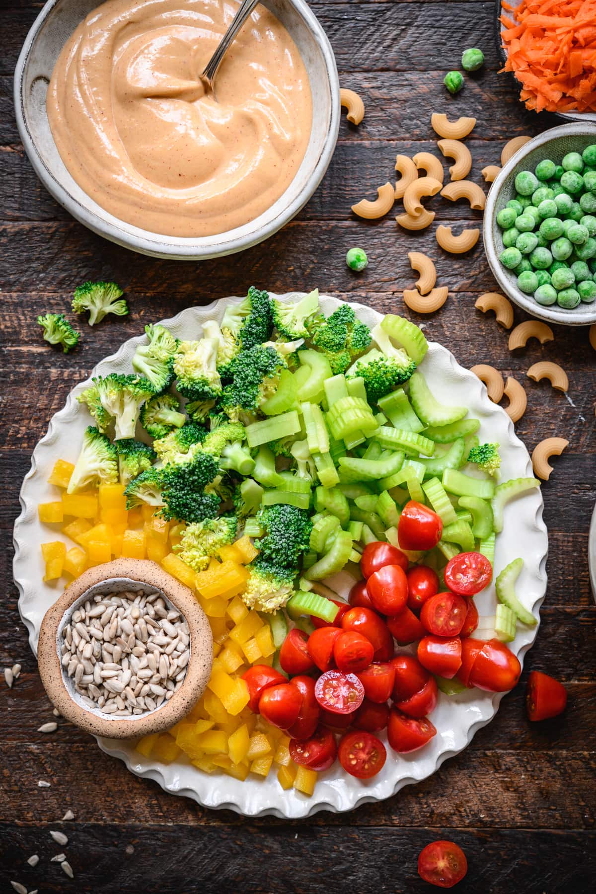 overhead view of ingredients for vegan macaroni vegetable salad