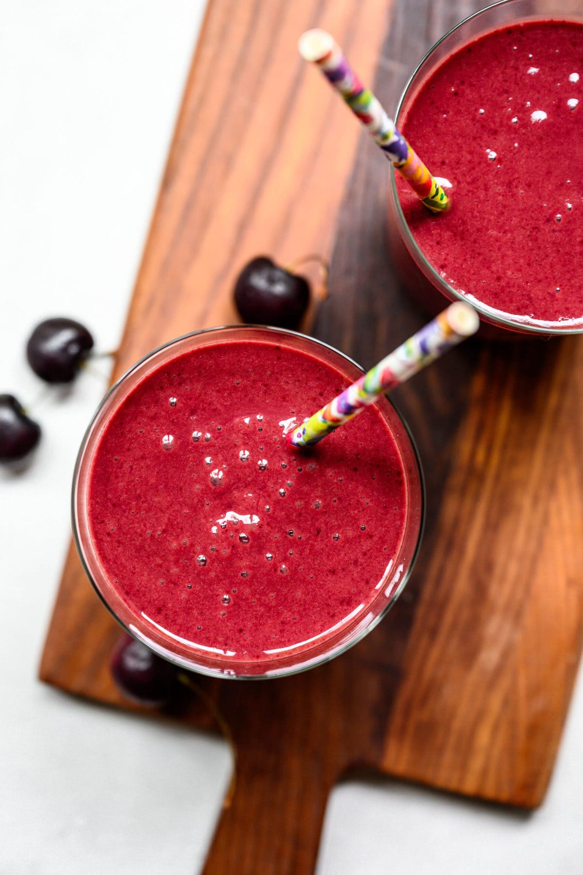 overhead view of beet smoothie in a glass