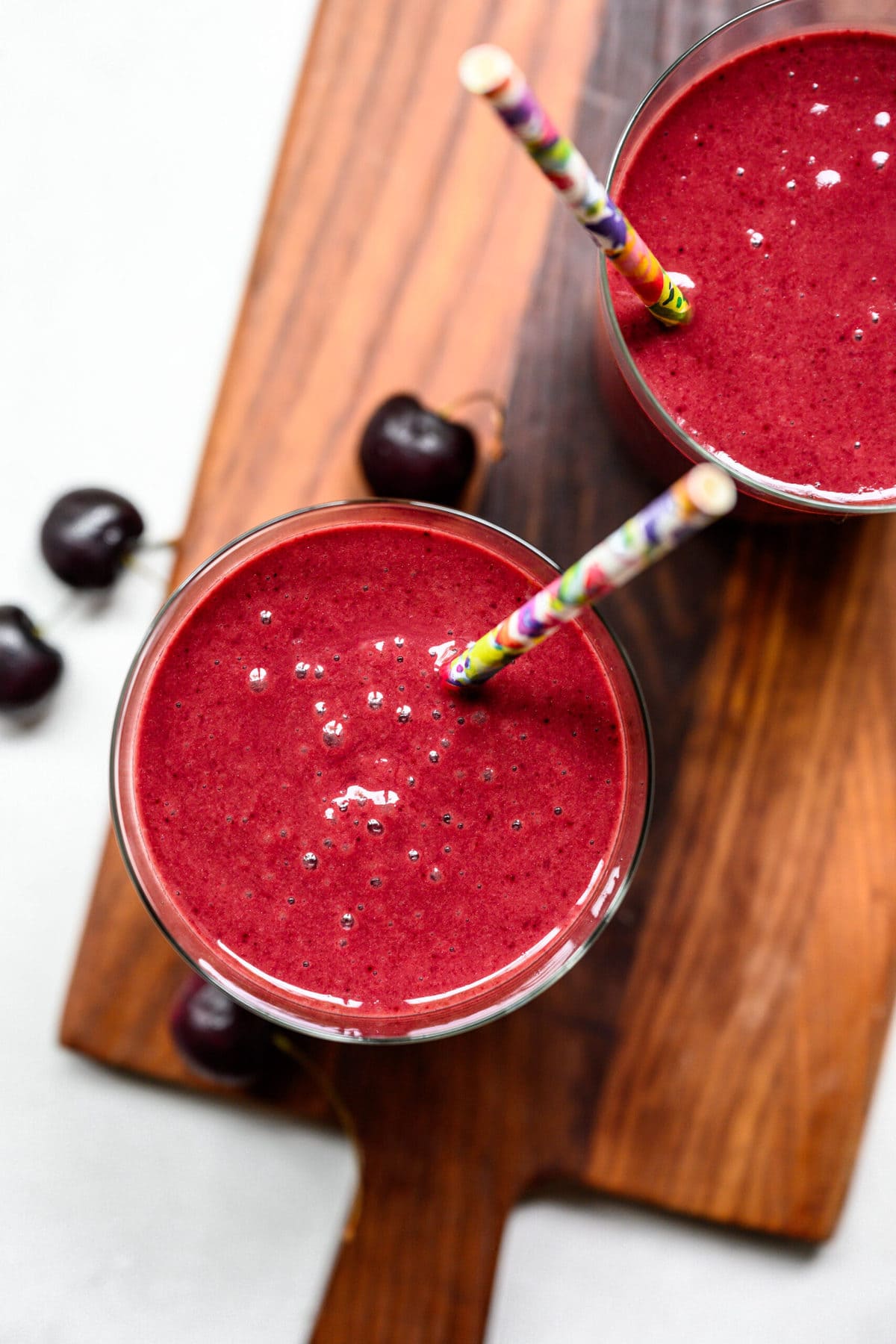 overhead view of beet smoothie in a glass