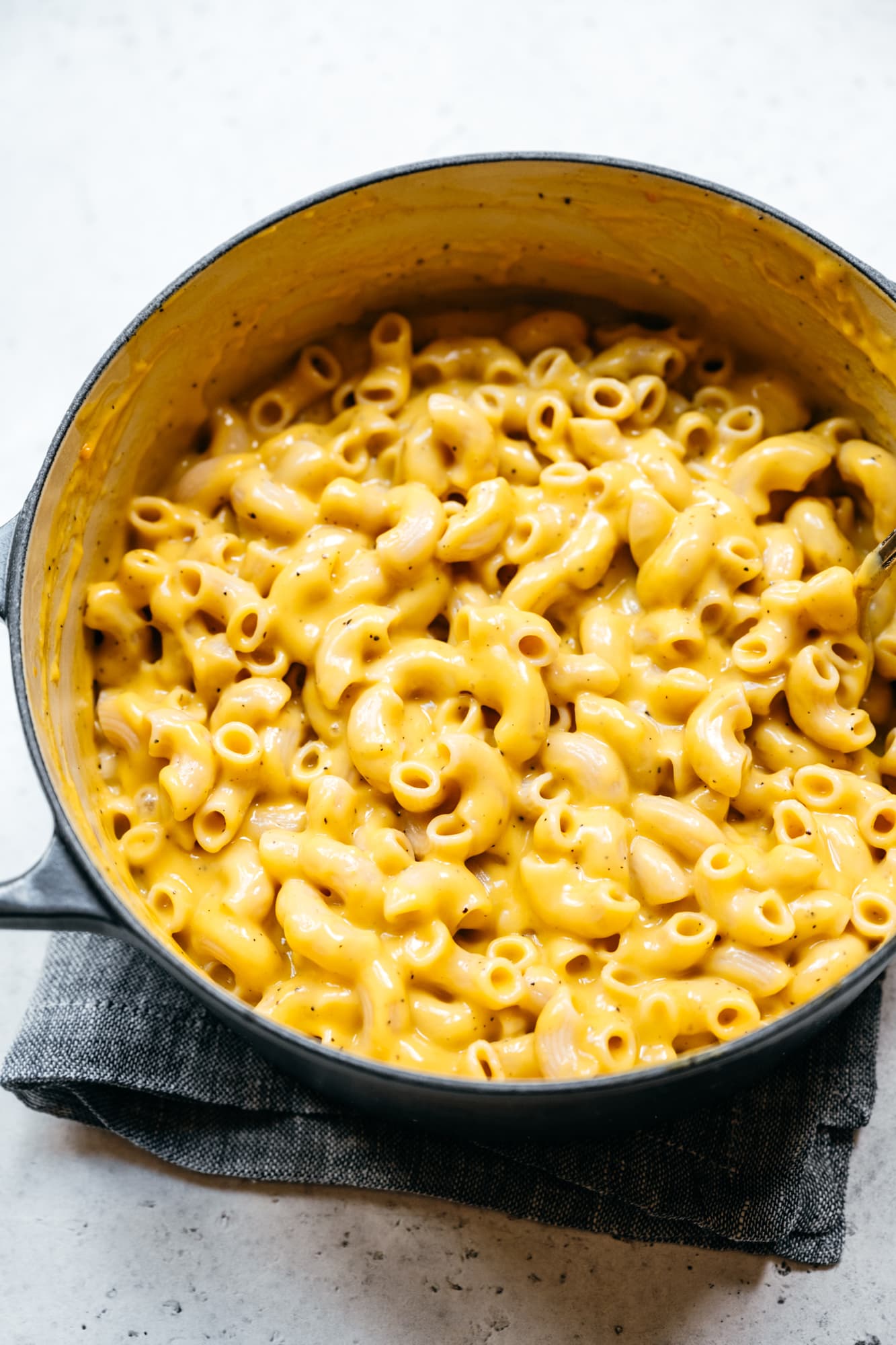 overhead view of creamy vegan mac and cheese in large pot