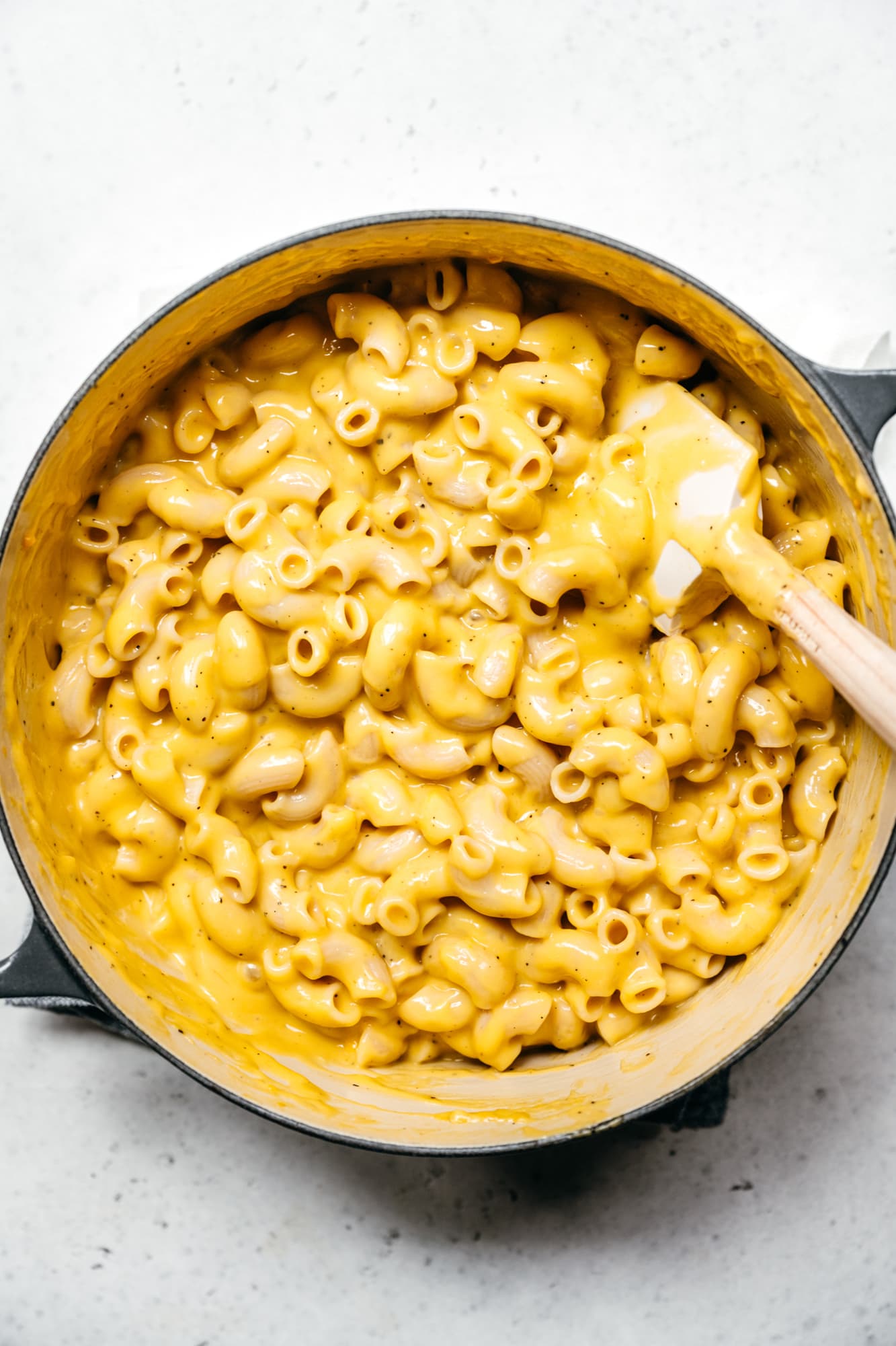 overhead view of creamy vegan mac and cheese in large pot