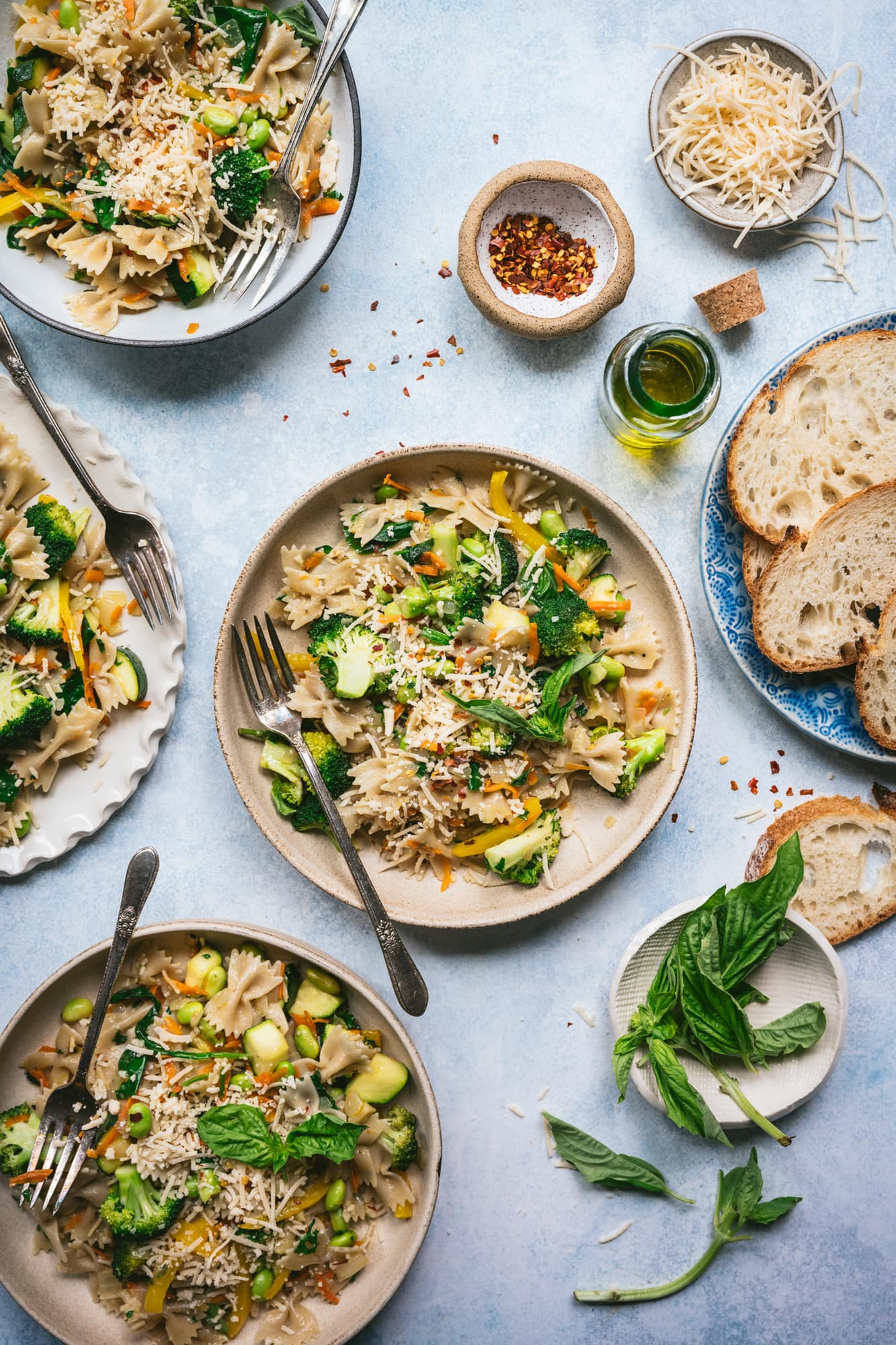 overhead view of vegan vegetable pasta in bowls