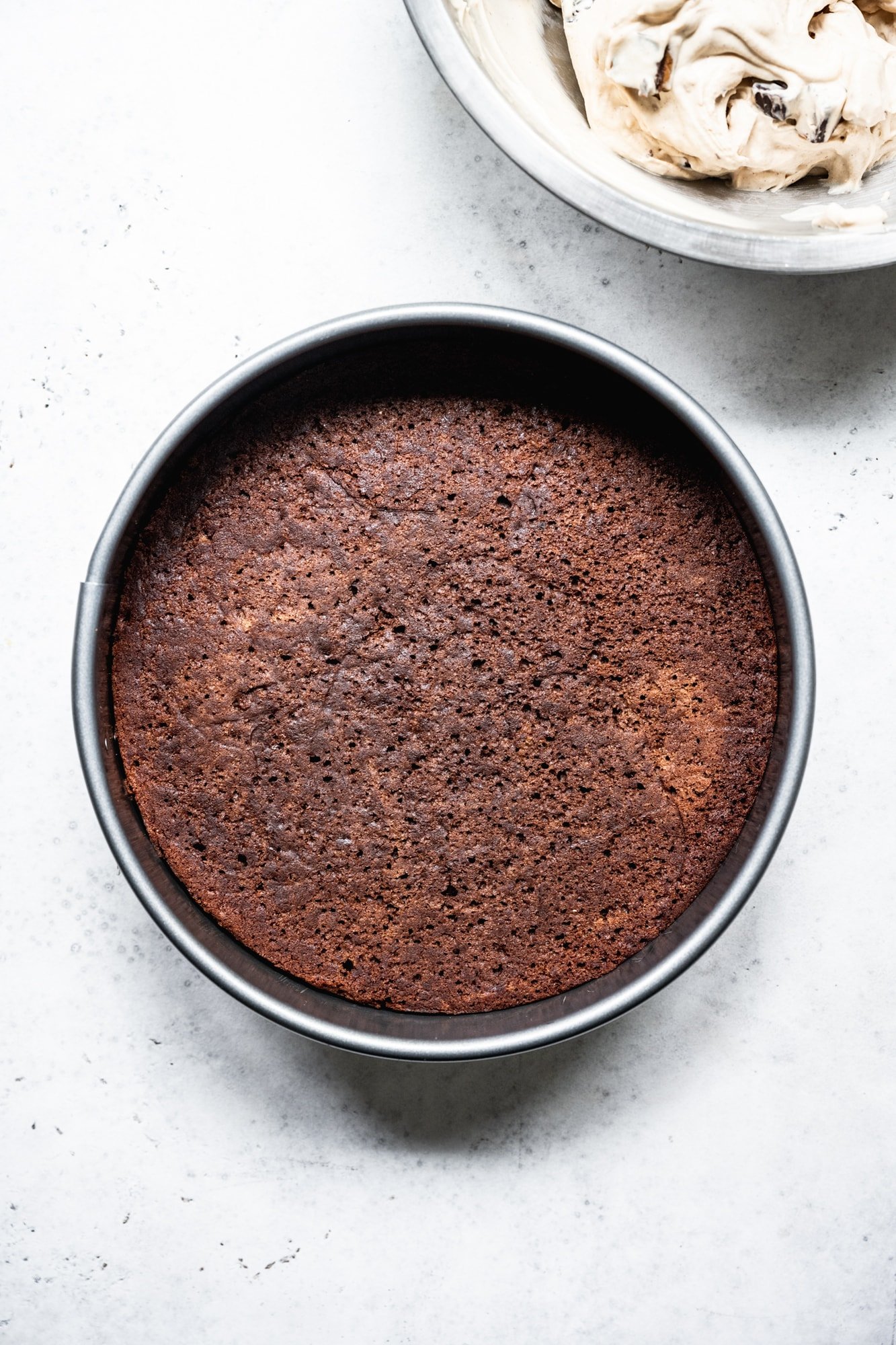overhead view of chocolate cake in cake pan
