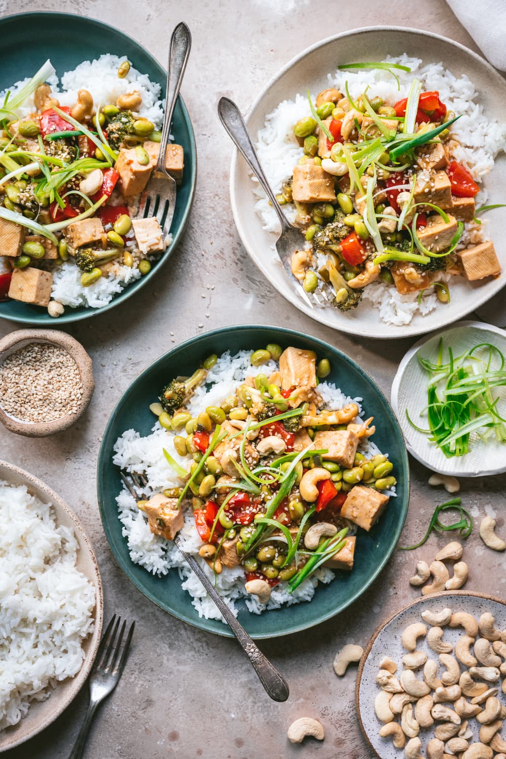 vegan teriyaki tofu vegetable stir fry in bowls