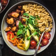 overhead view of savory vegan breakfast bowl with potatoes and scrambled tofu