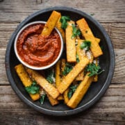 overhead view of polenta fries with marinara