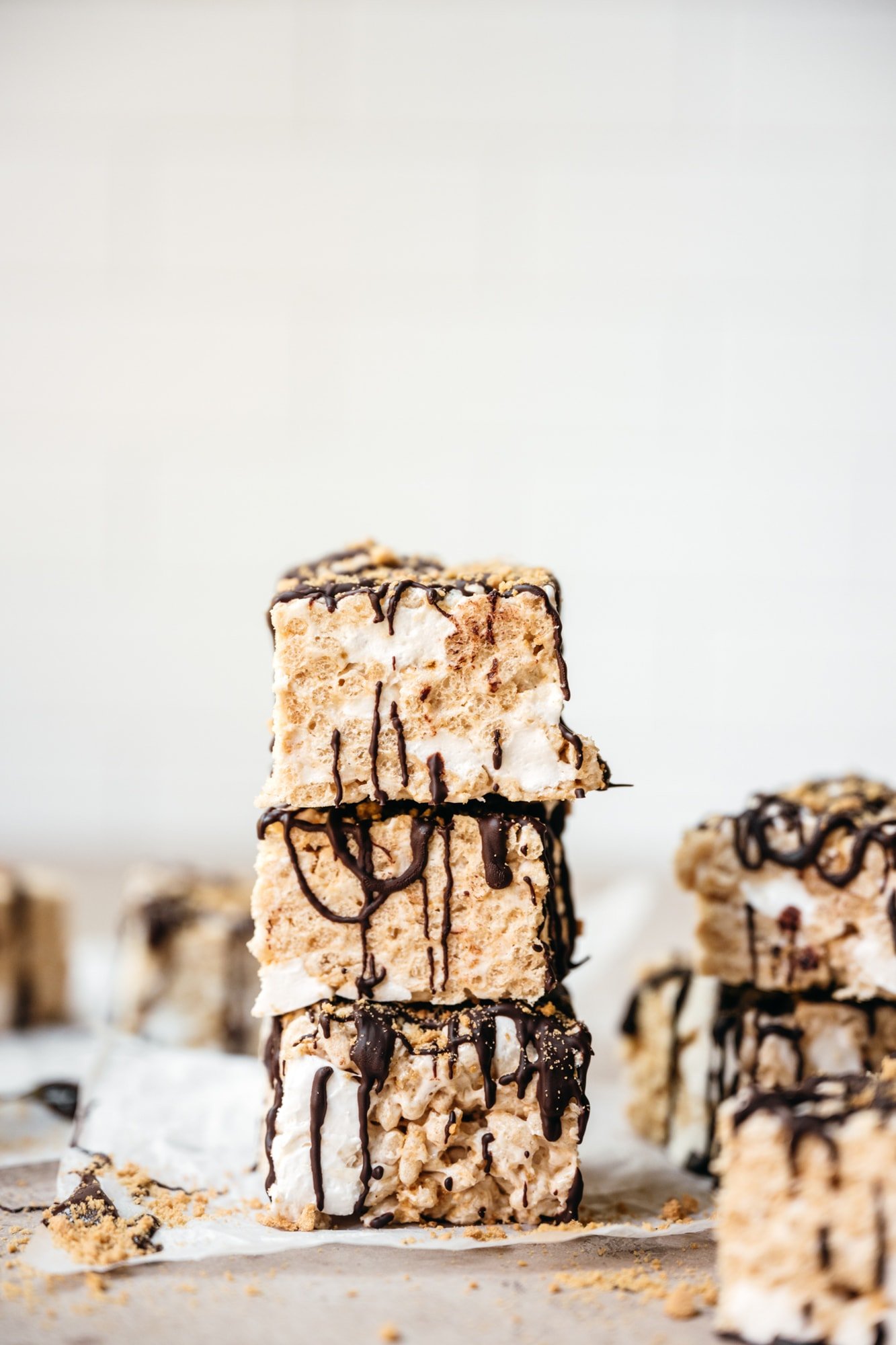 side view of stack of rice krispie treats with chocolate