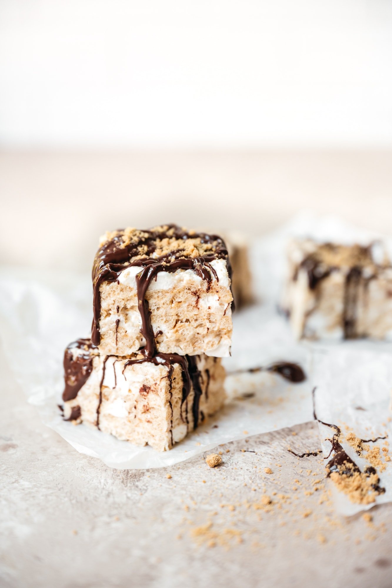 side view of stack of rice krispie treats with chocolate