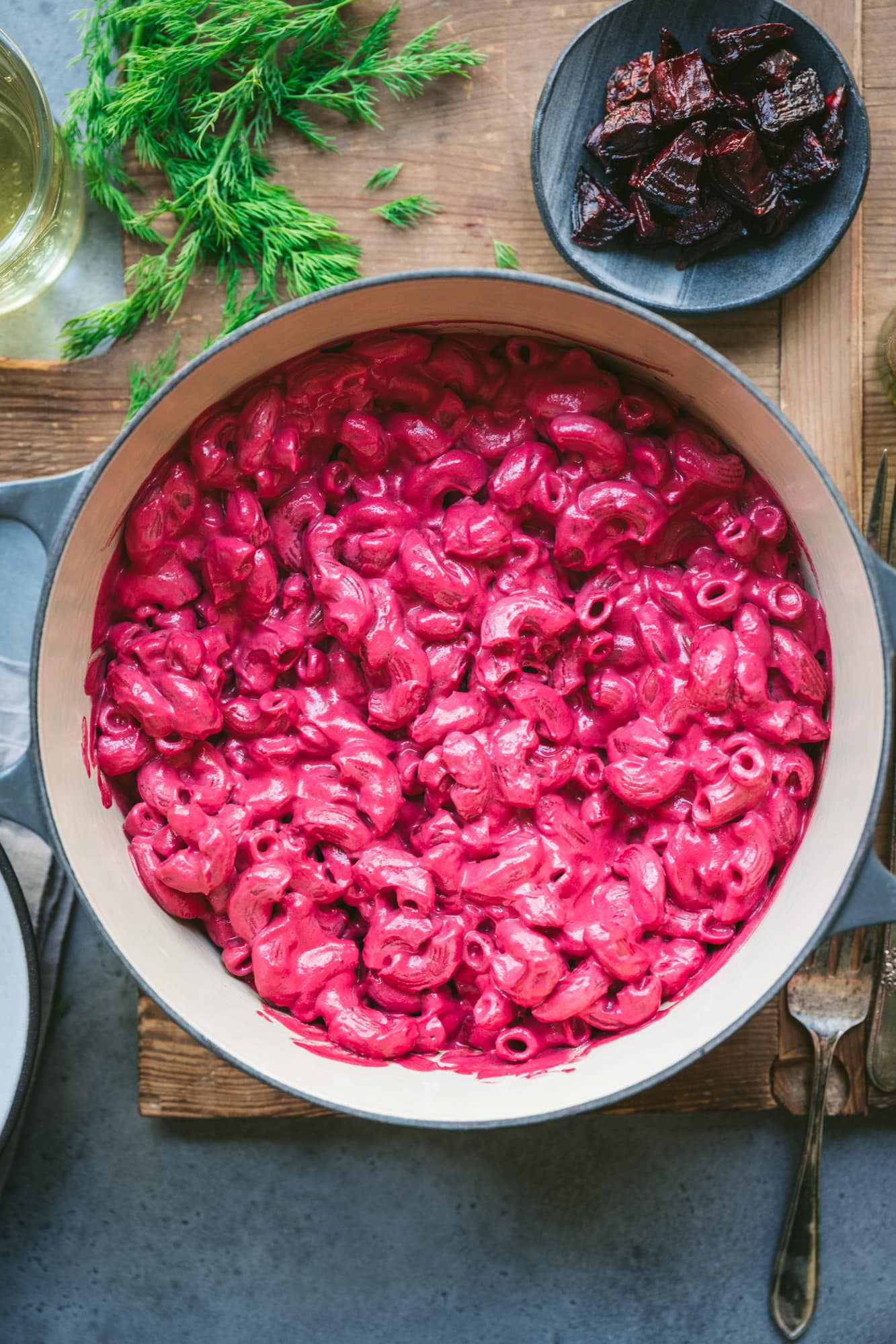 overhead view of vegan creamy beet pasta in large pot.