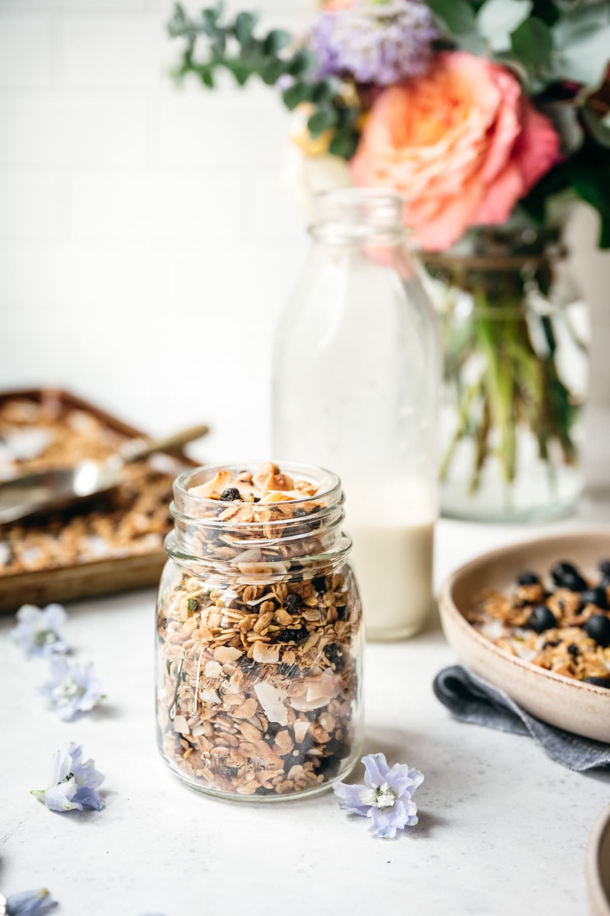 side view of homemade blueberry lemon granola in a jar