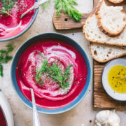 Bowl of beet soup seen from above.