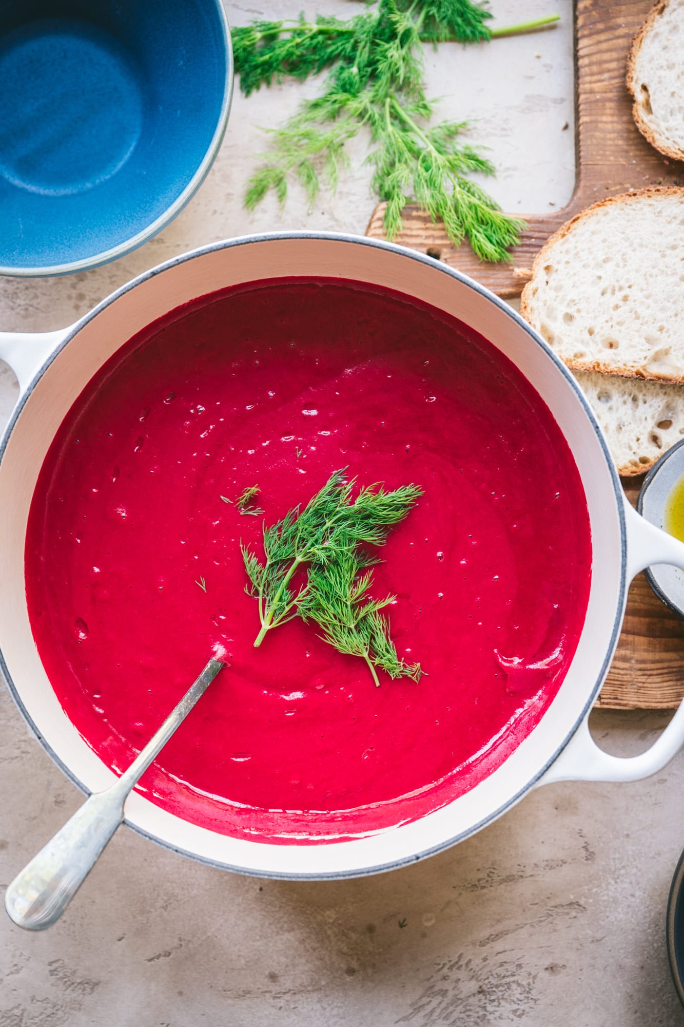 overhead view of creamy vegan beets soup in pot