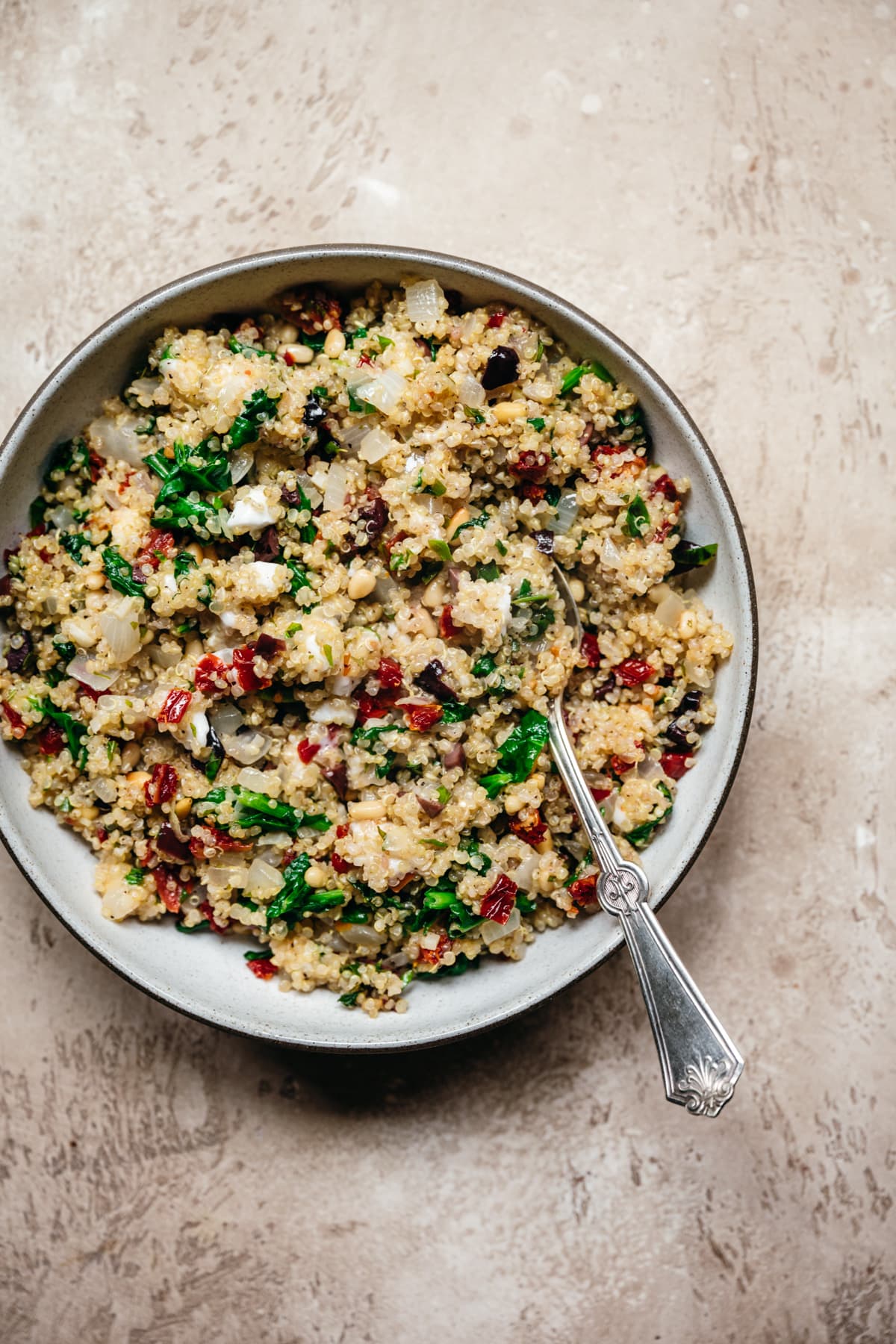 overhead view of mediterranean quinoa filling in bowl