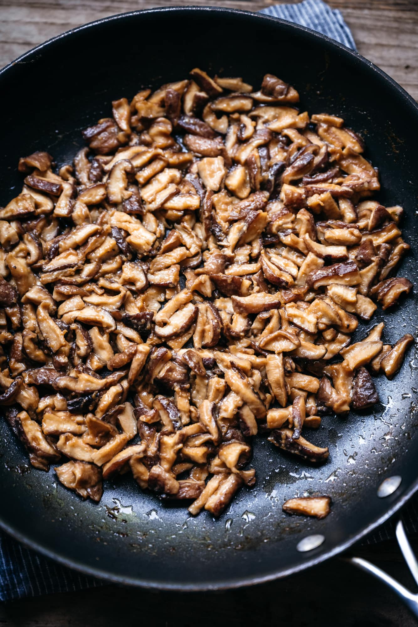 overhead view of shiitake mushroom "clams" in a pan