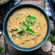 overhead view of vegan mushroom clam chowder in a blue bowl