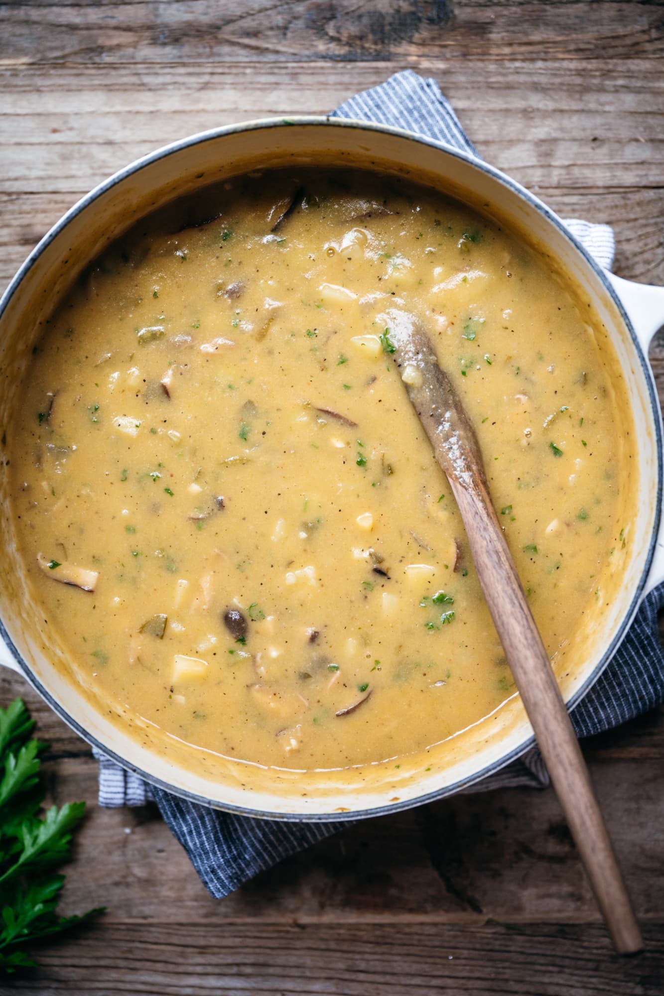 overhead view of vegan clam chowder in a soup pot