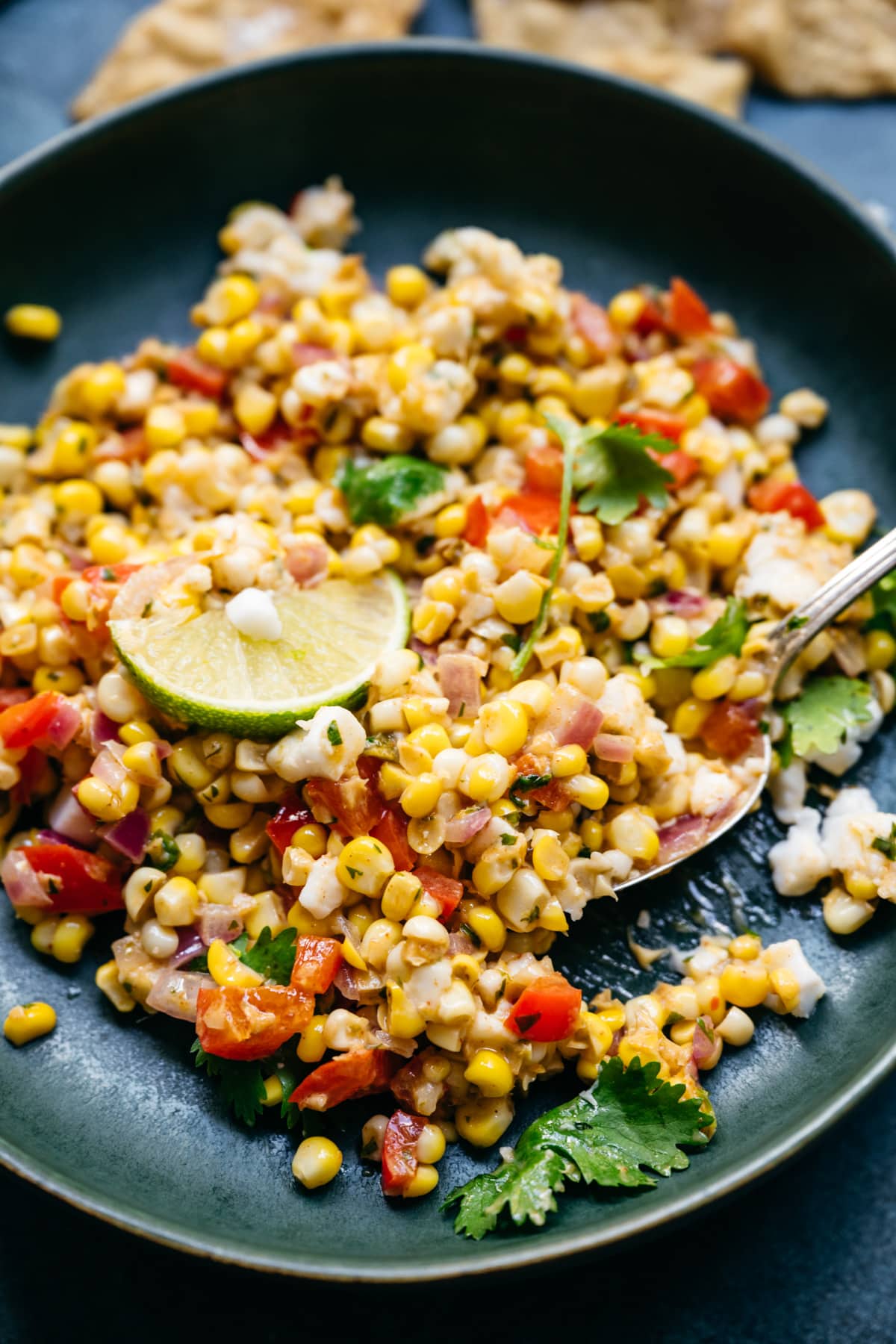 close up view of vegan corn salad in a bowl 