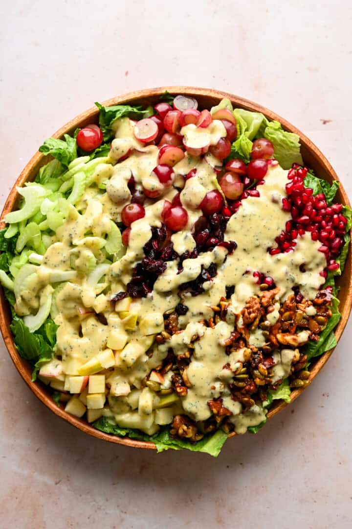 Overhead view of waldorf salad in a bowl before mixing the components together.