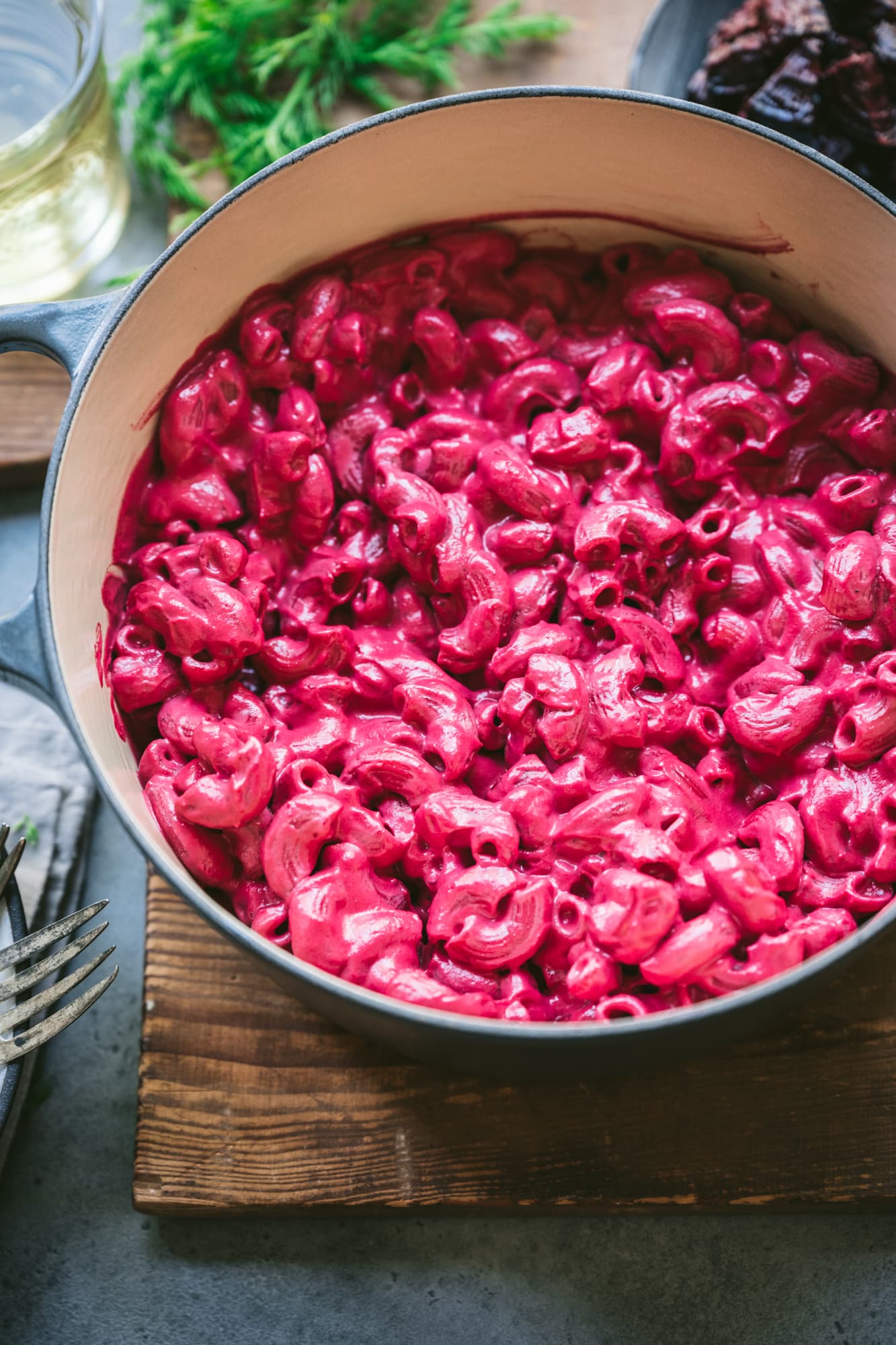 side view of vegan beet pasta in a large pot.