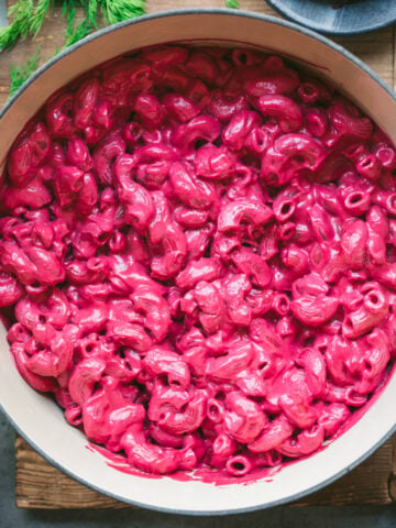 overhead view of vegan creamy beet pasta in large pot.