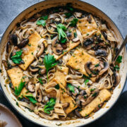 overhead view of vegan tofu marsala in a large pan.