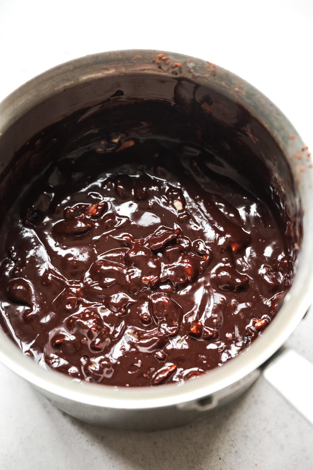 close up view of vegan fudge in saucepan before freezing.