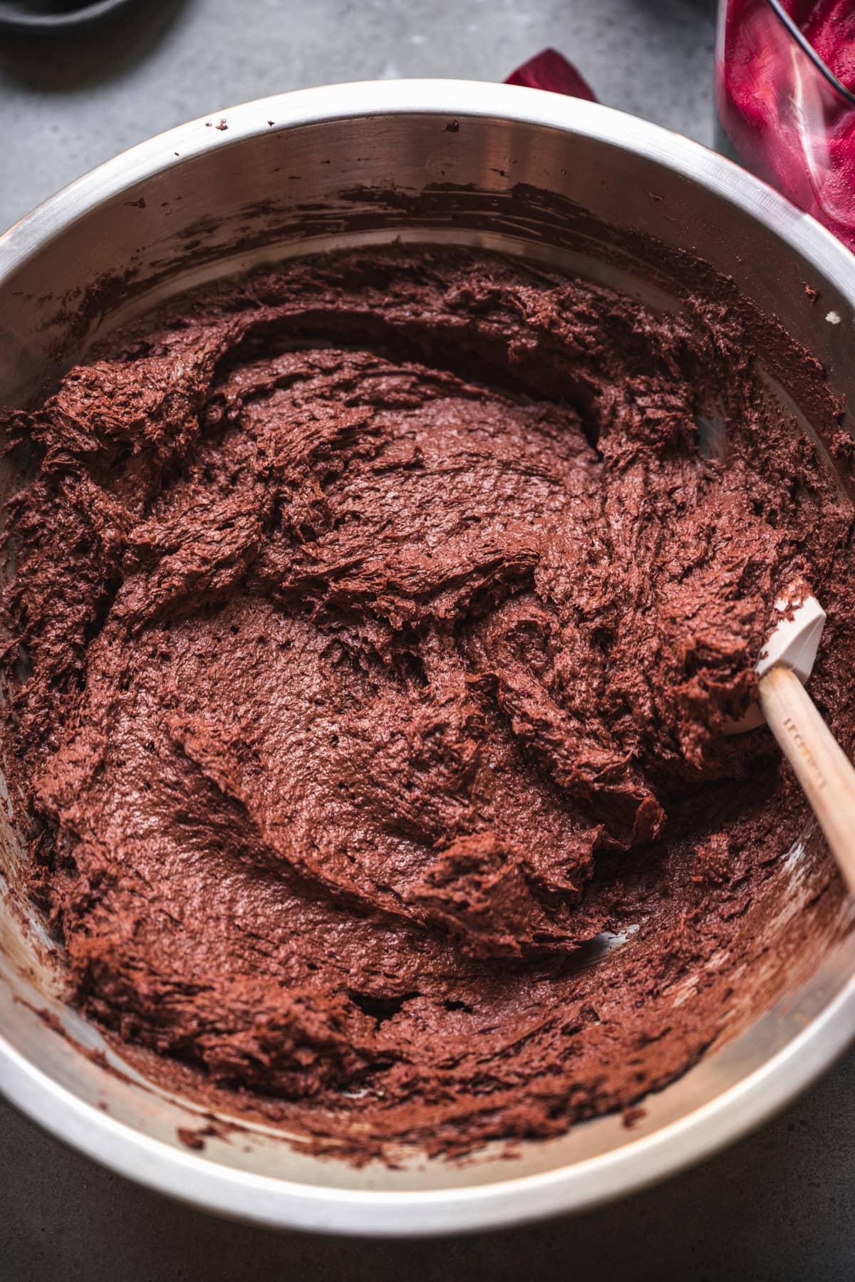 overhead view of beet brownie batter in a bowl.
