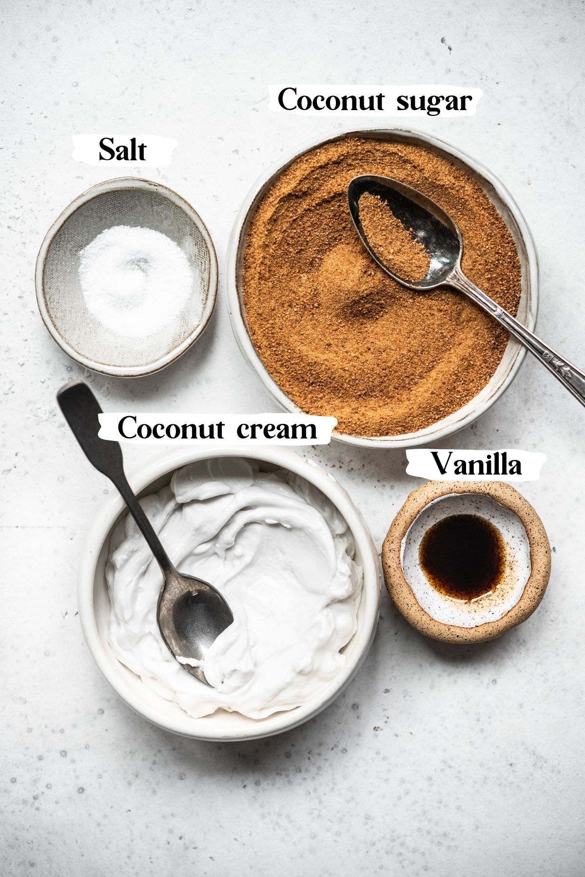 overhead view of ingredients for vegan caramel sauce in bowls. 