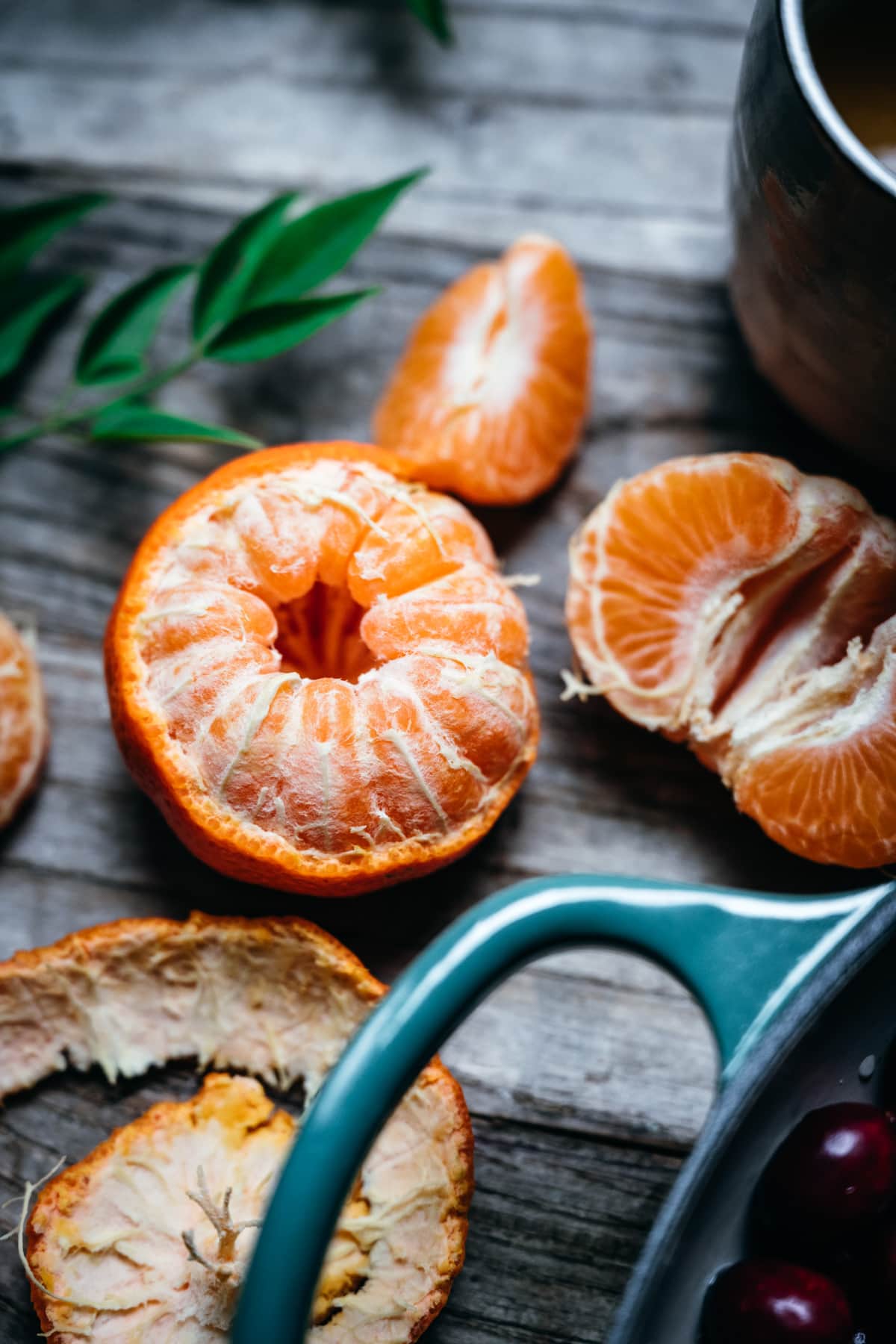 close up view of half peeled mandarin orange.