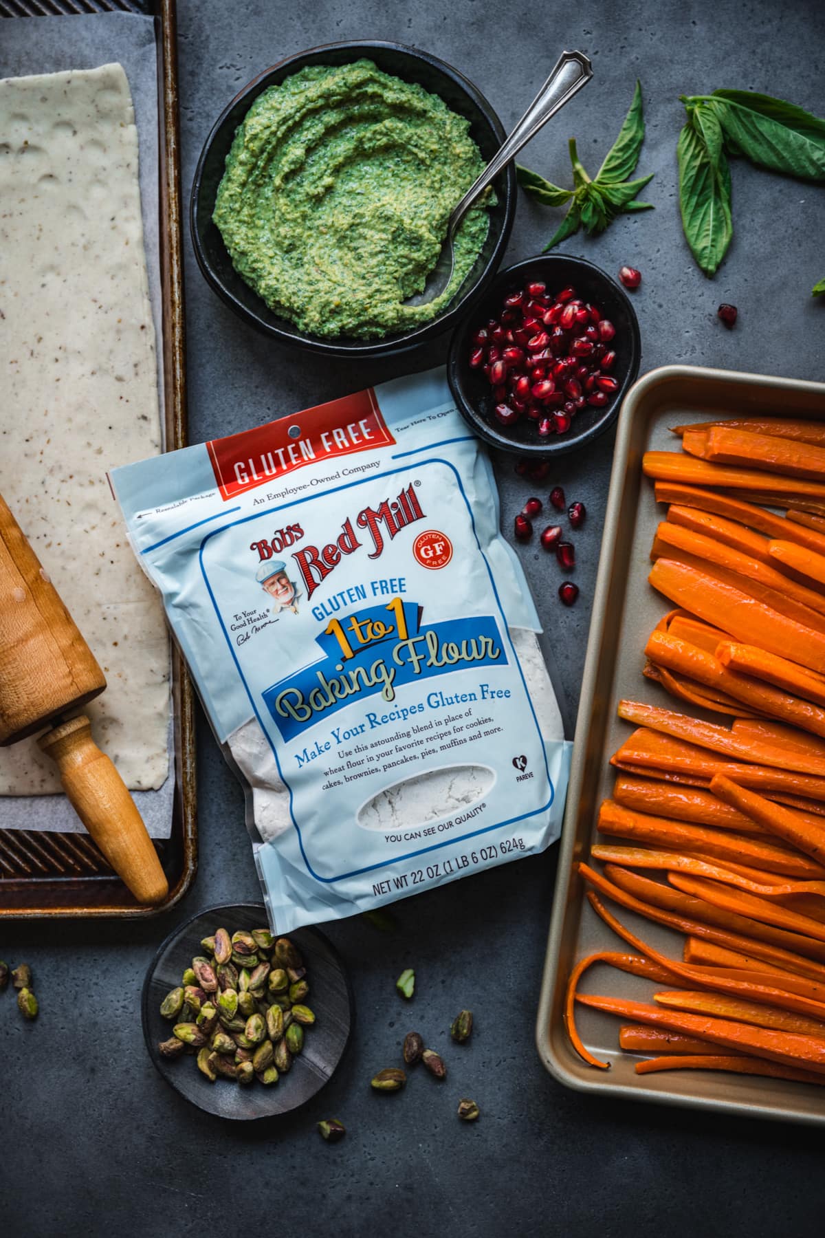 overhead view of ingredients for carrot pesto galette with Bob's Red Mill gluten free flour. 