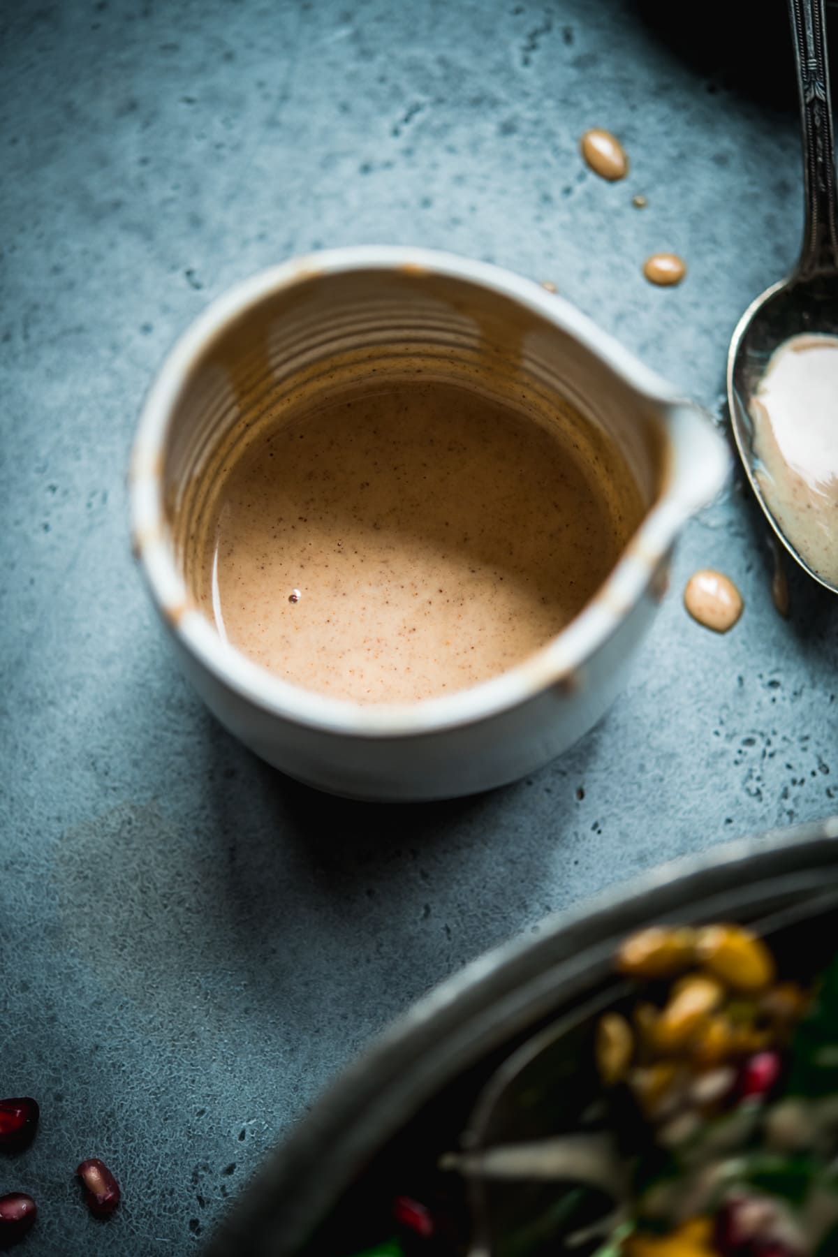 maple tahini dressing in a small bowl. 