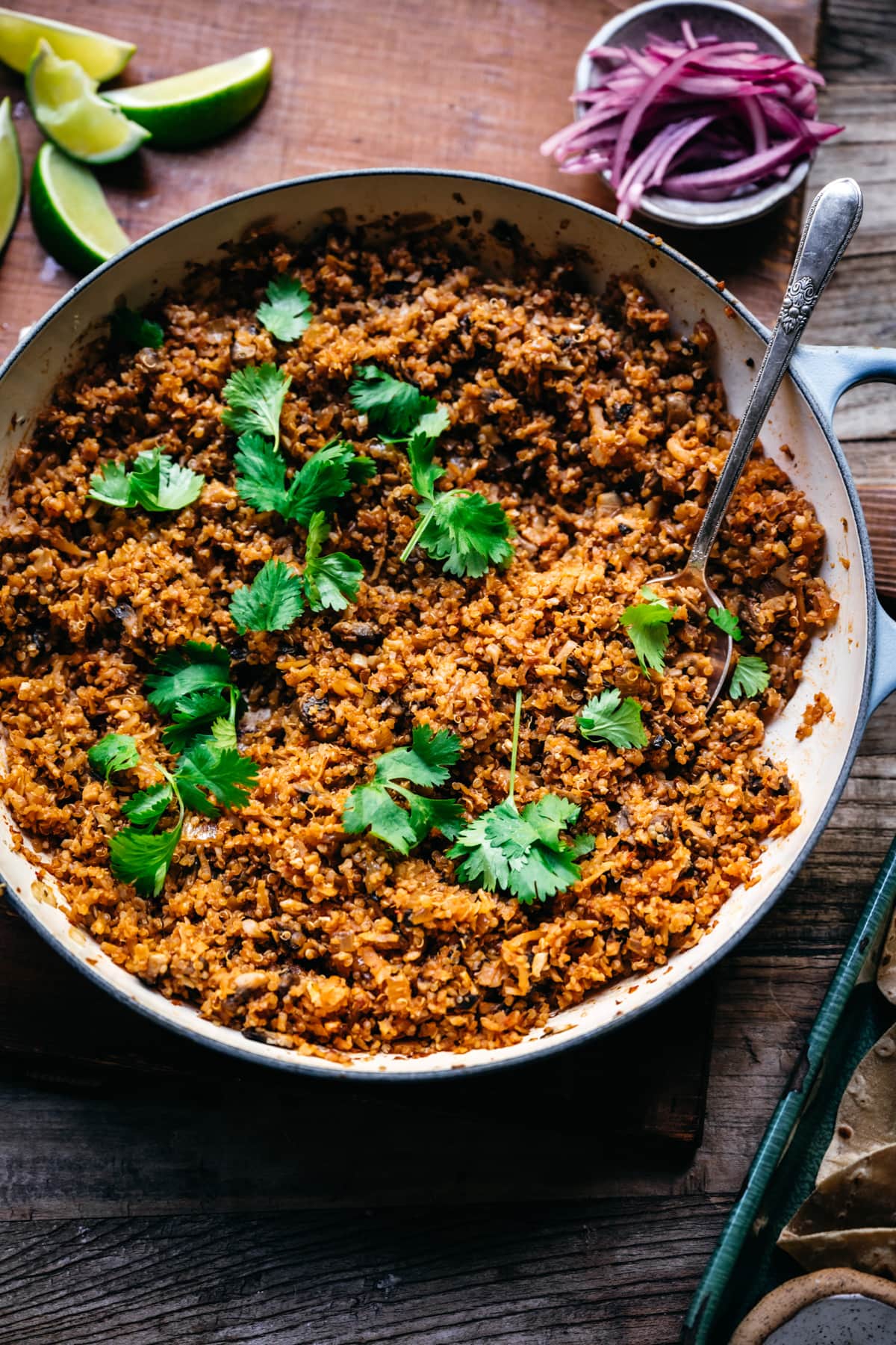 vegan taco meat in a large pan garnished with cilantro. 