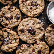 overhead view of chocolate chip cookies on a sheet pan.