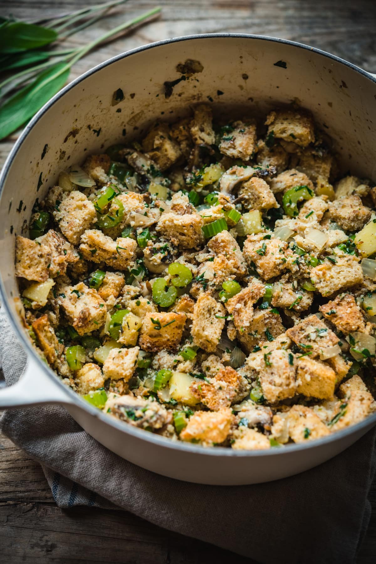 Stuffing ingredients in a pot before baking. 