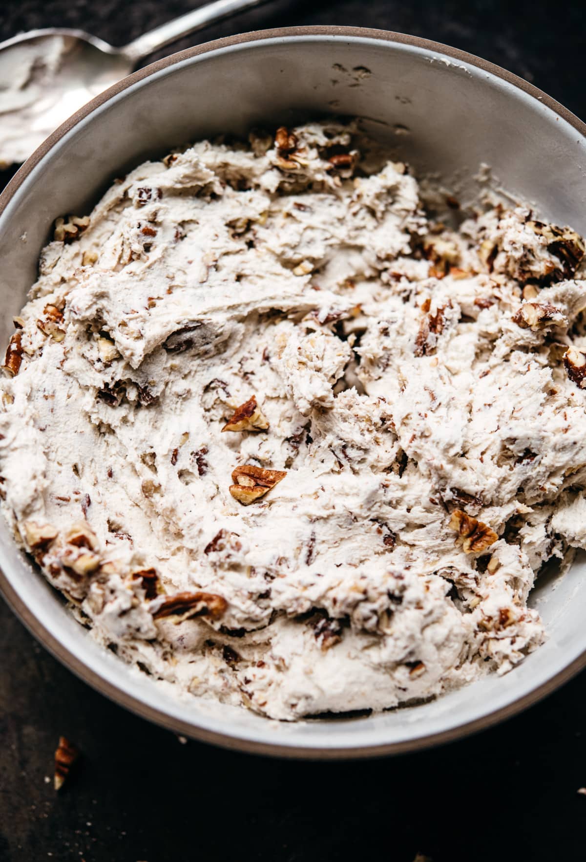 snowball cookie dough in a white bowl.