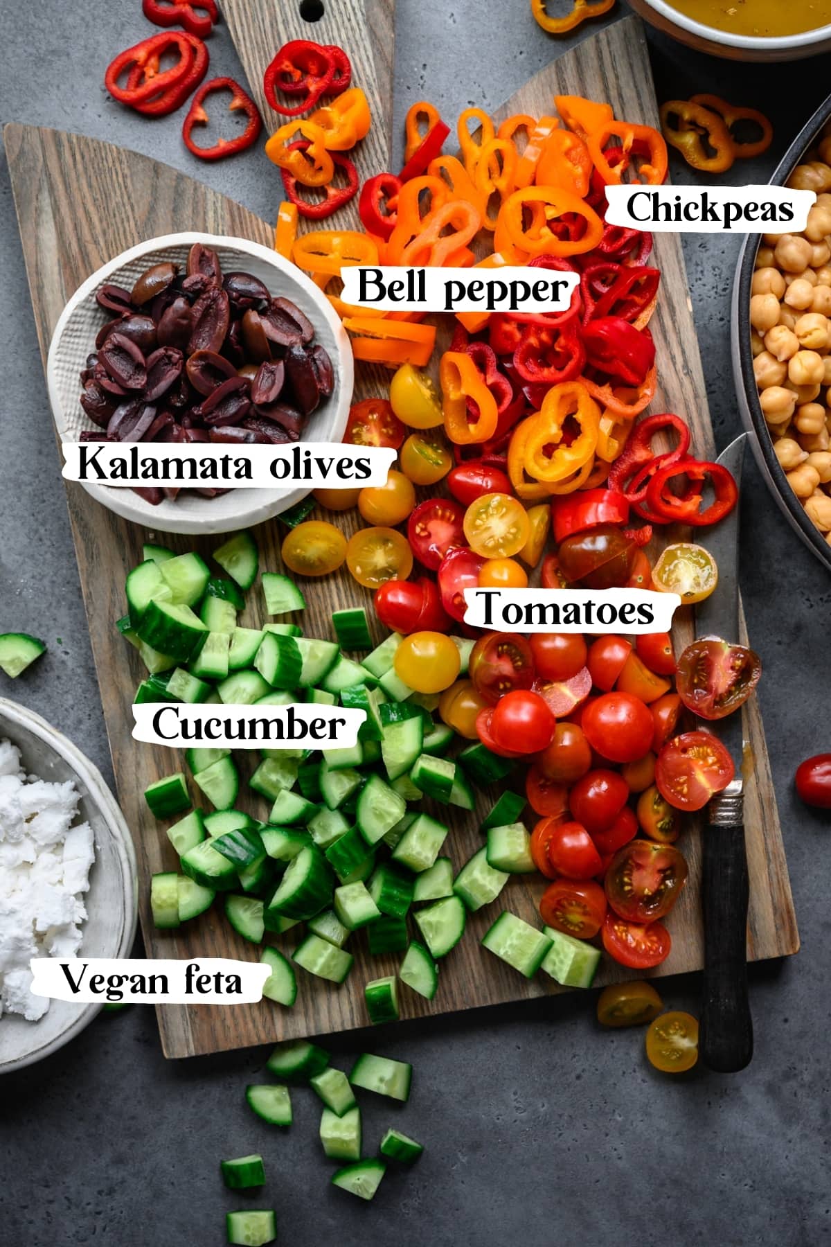 overhead view of ingredients for greek chickpea salad. 