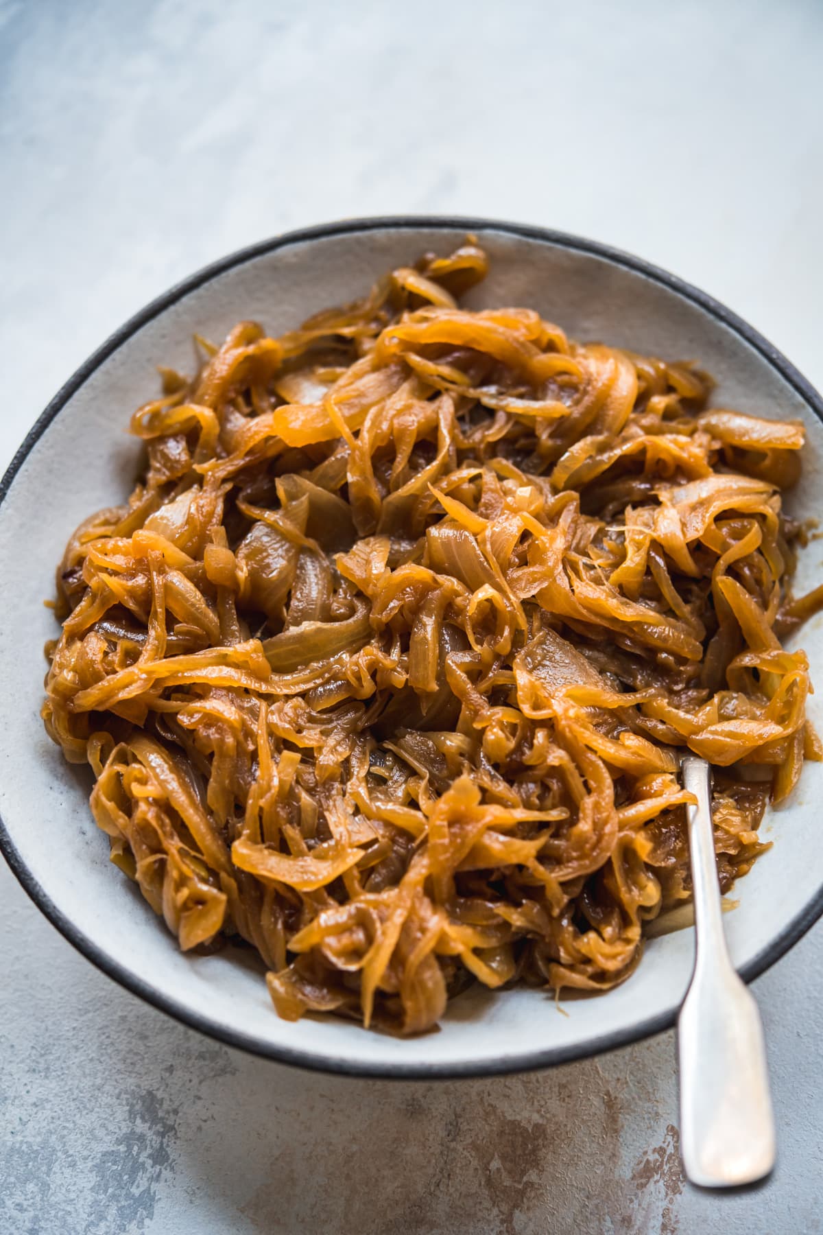 close up of caramelized onions in a bowl. 