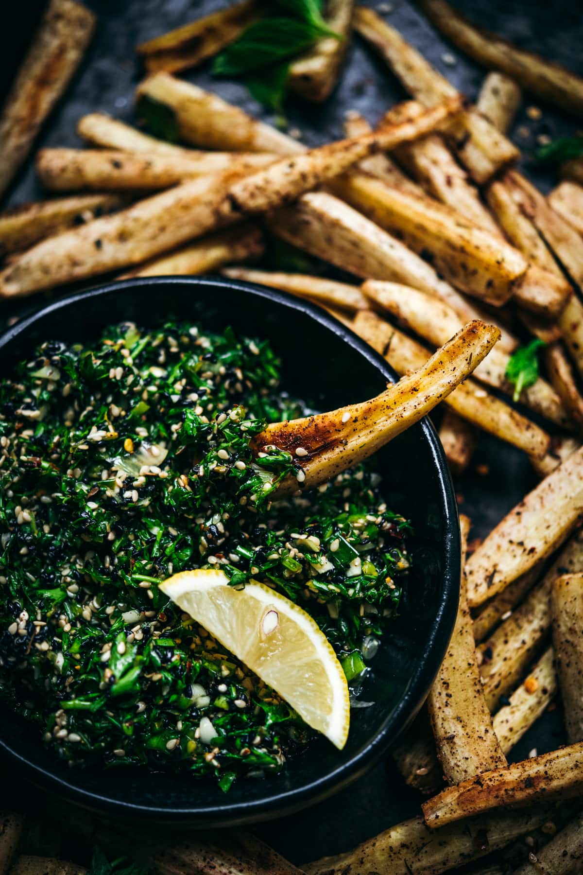 close up view of za'atar roasted parsnips. 
