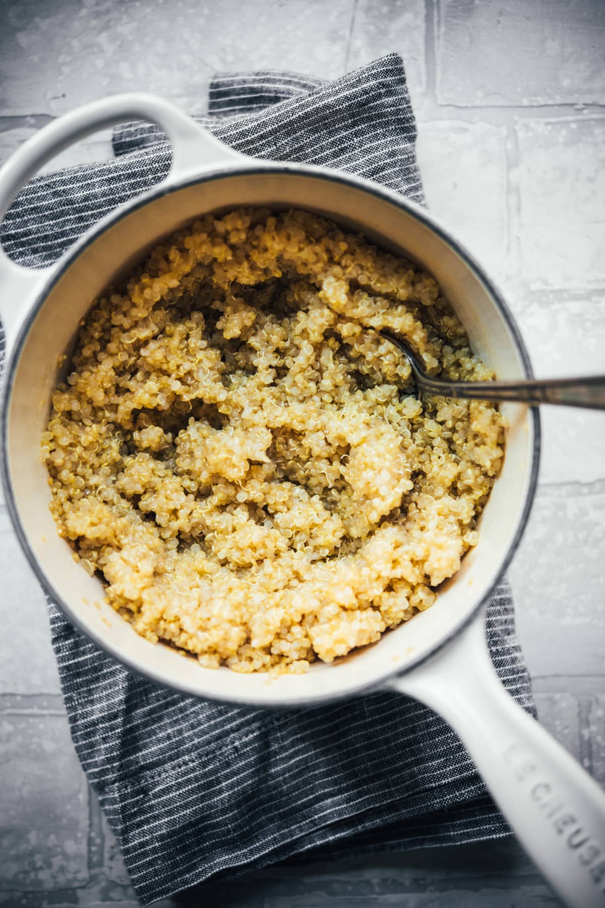 overhead view of cooked quinoa in a small saucepan.