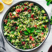 overhead view of vegan quinoa tabbouleh in a salad bowl.