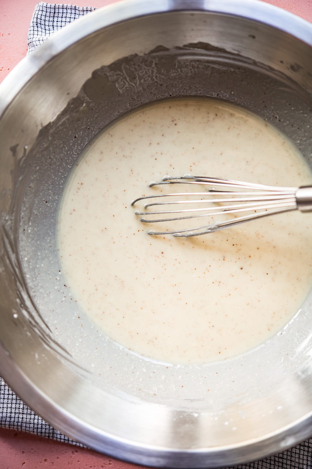 homemade vegan white chocolate melted in a bowl.