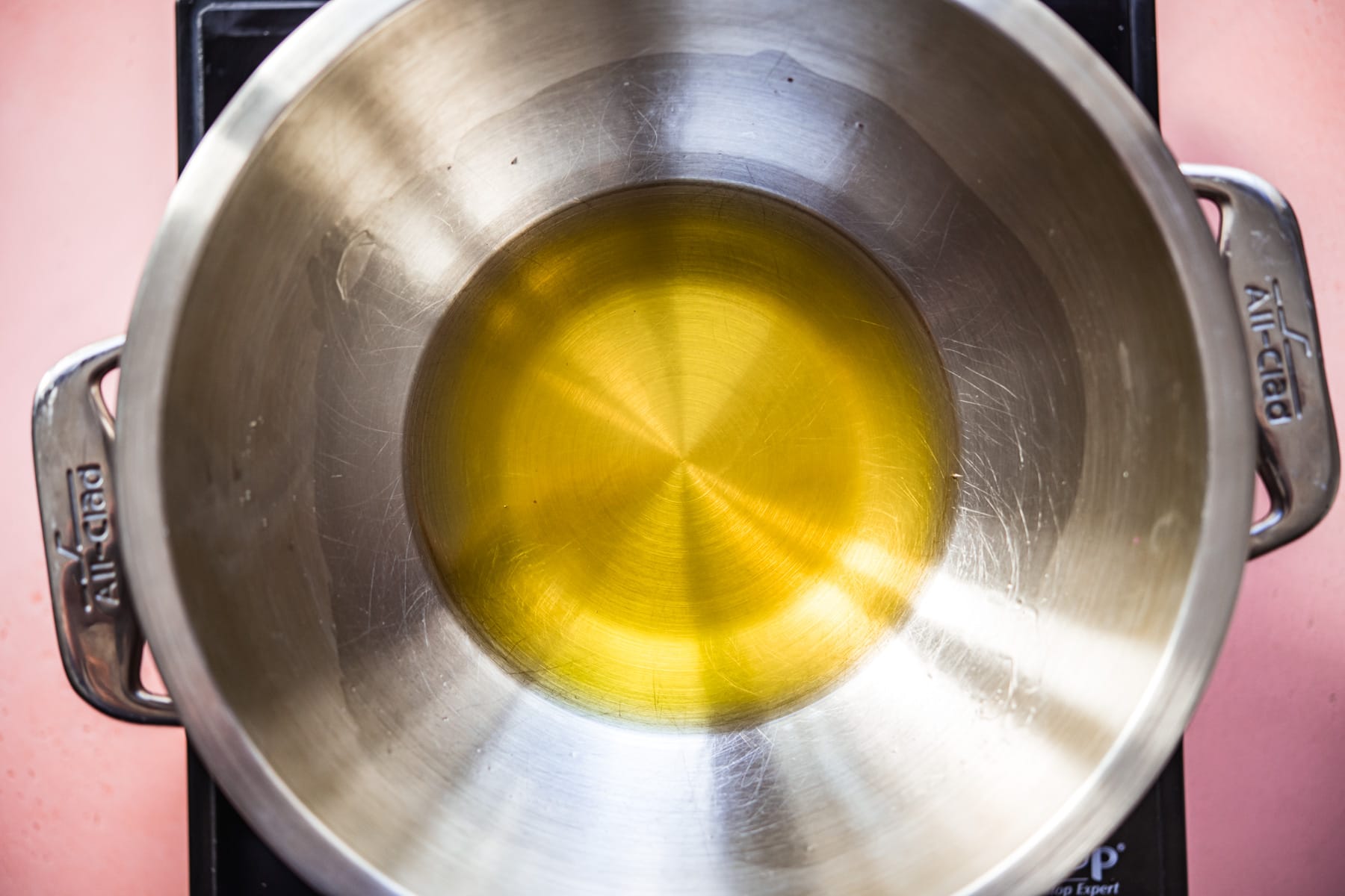 overhead view of melted cacao butter in a double boiler. 