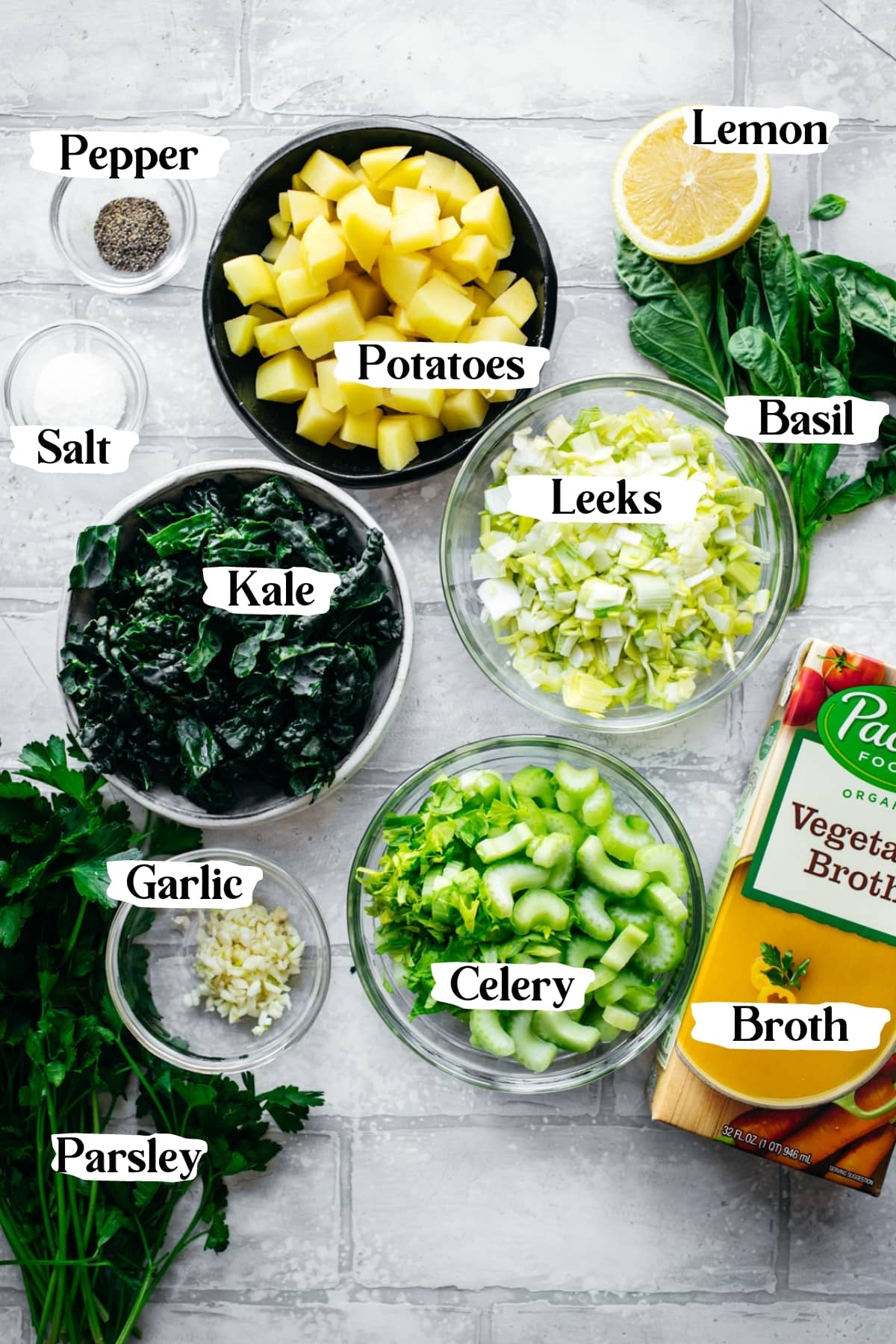 overhead view of ingredients for vegan potato kale soup.