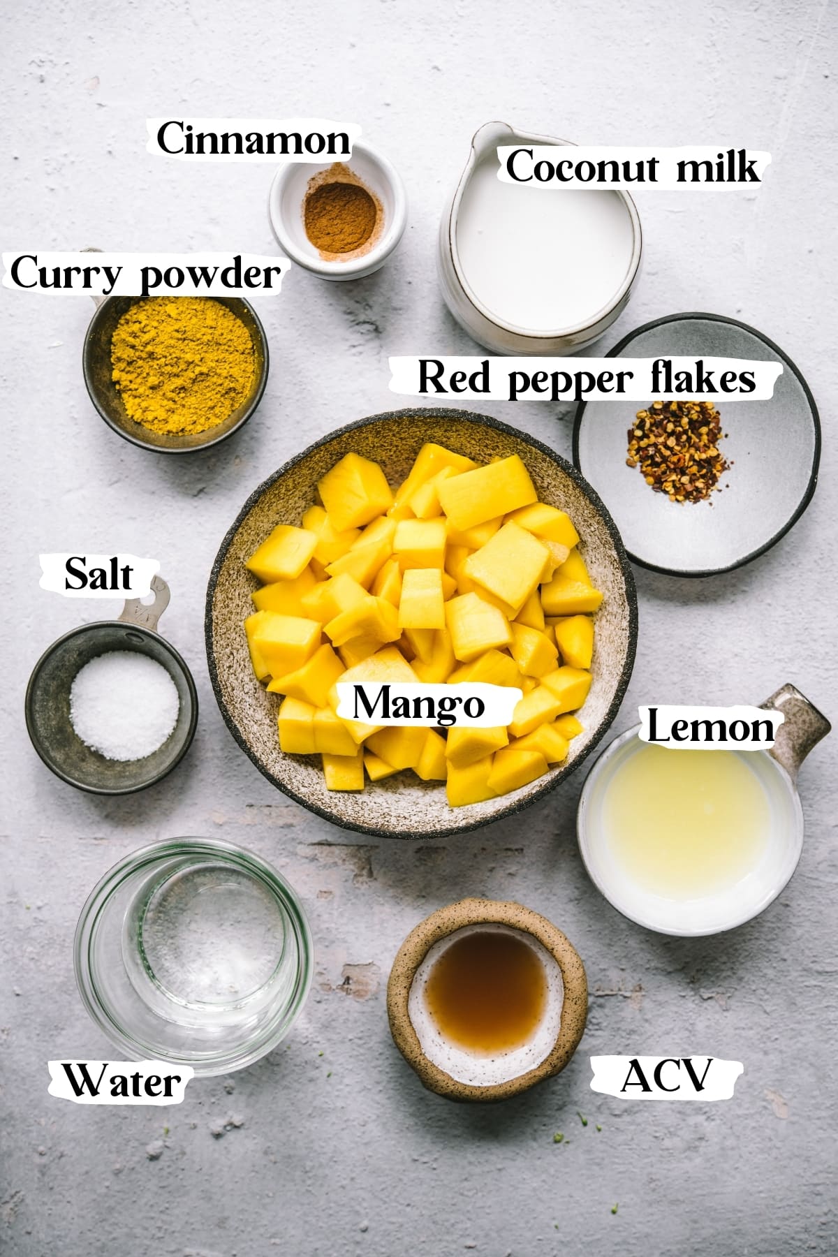overhead view of ingredients for mango curry sauce. 