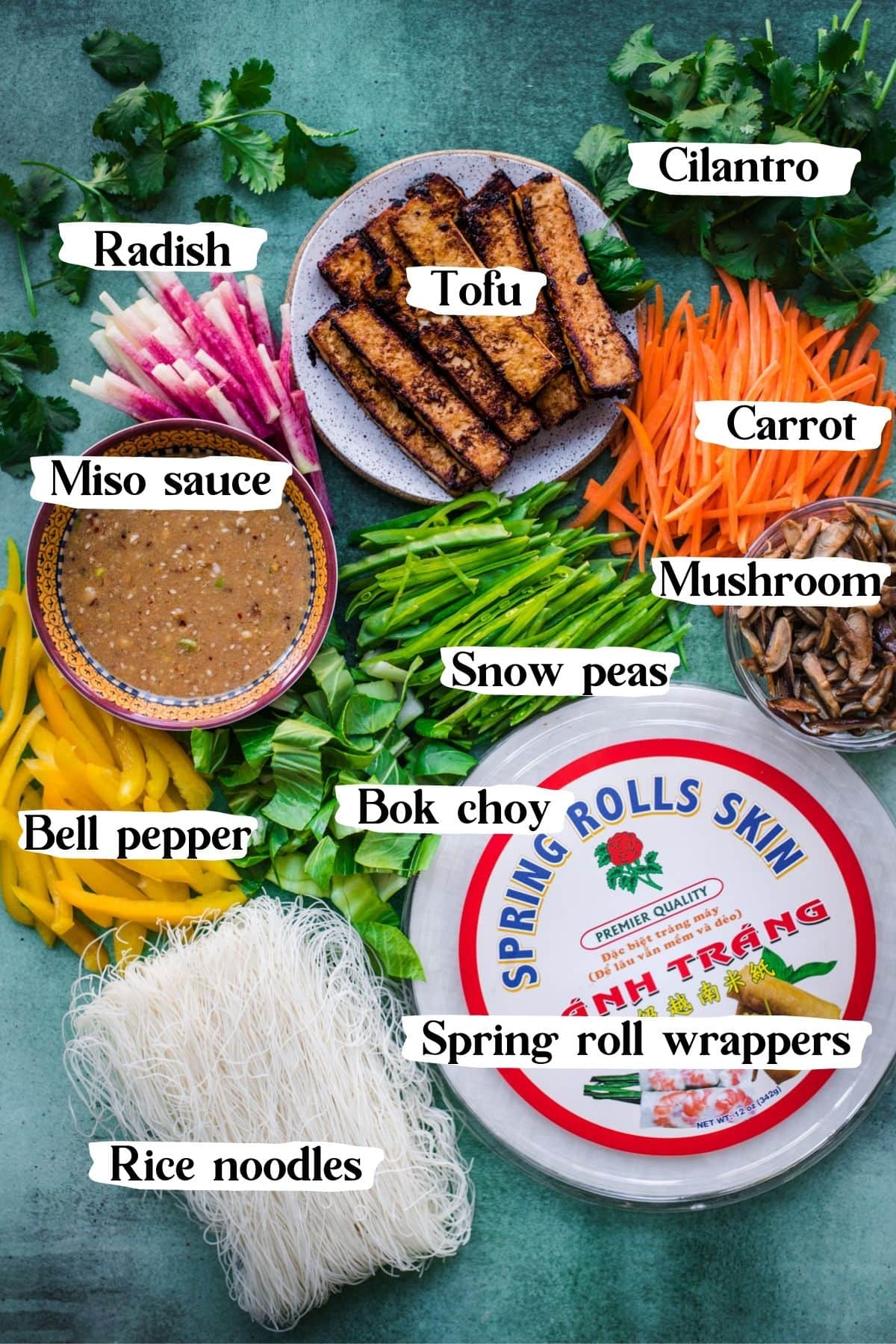 overhead view of ingredients for tofu vegetable vegan summer rolls. 