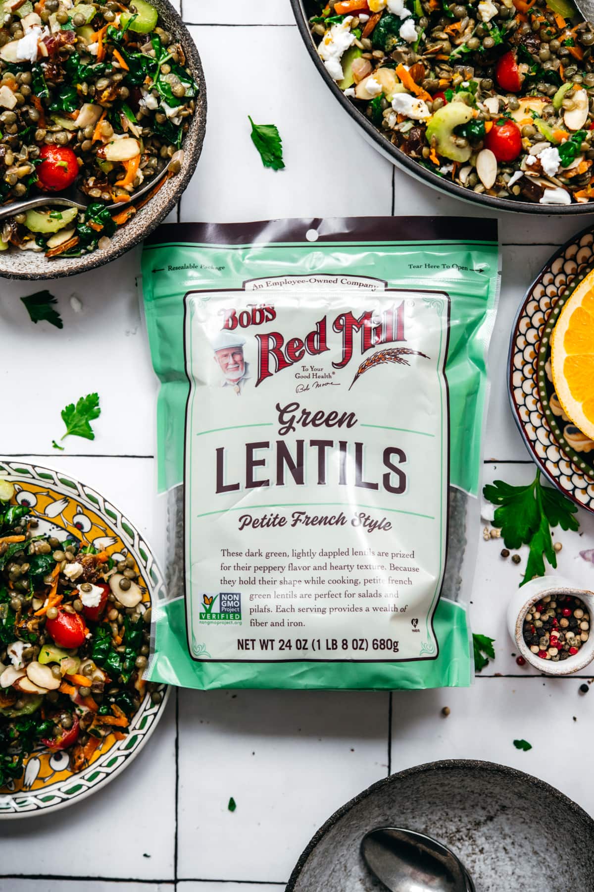 overhead view of bag of bob's red mill green lentils next to lentil salad. 