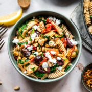 overhead view of vegan greek pasta in a large skillet.