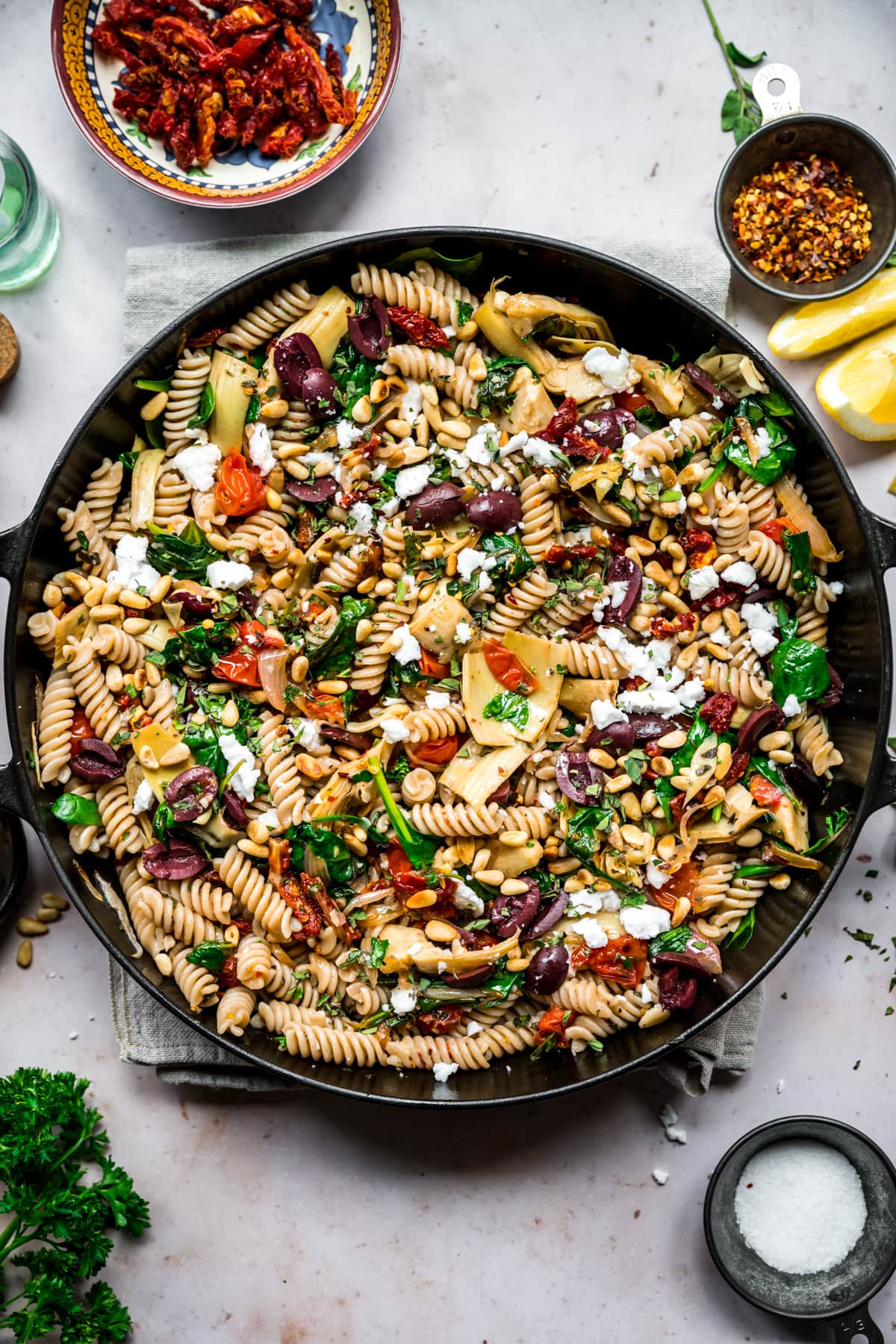 overhead view of vegan greek pasta in a large skillet.